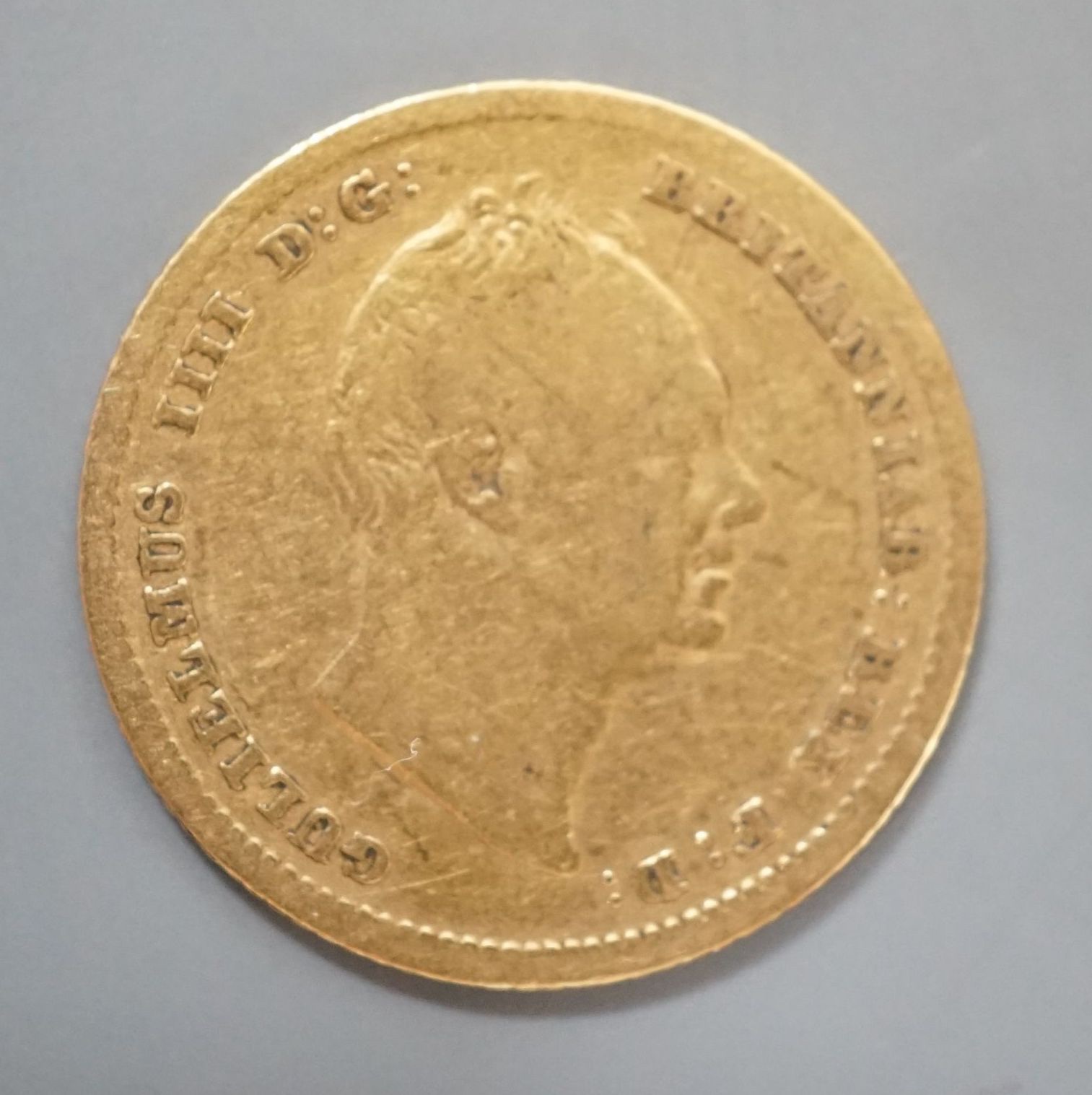 A William IV gold half sovereign, 1835, VG or better.